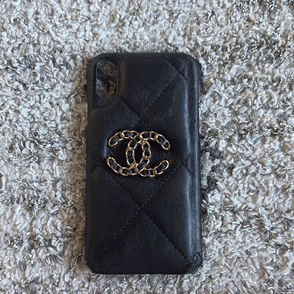 CHANEL Other - CHANEL Black Quilted Phone Case with Gold detailing.
